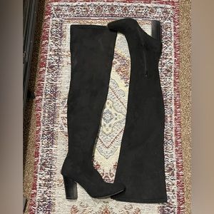 Black thigh high heel boot